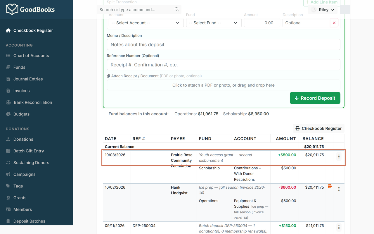 The register with the new $500 deposit highlighted as the top row and the running balance updated